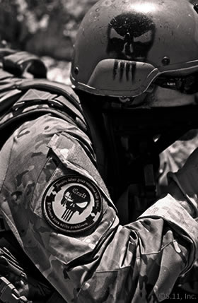 Craft International tactical gear – note the skull symbol painted on the helmet and emblazoned on the uniform patch
